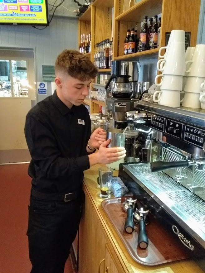 Harrison making coffee