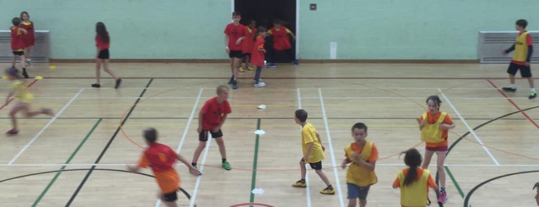 Children playing in a Gymnasium