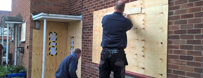 Boarding up house - web.jpg