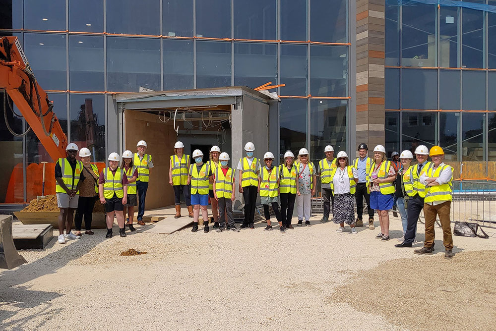 group shot outside the reef building