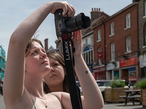 Students receive a photography masterclass from Historic England