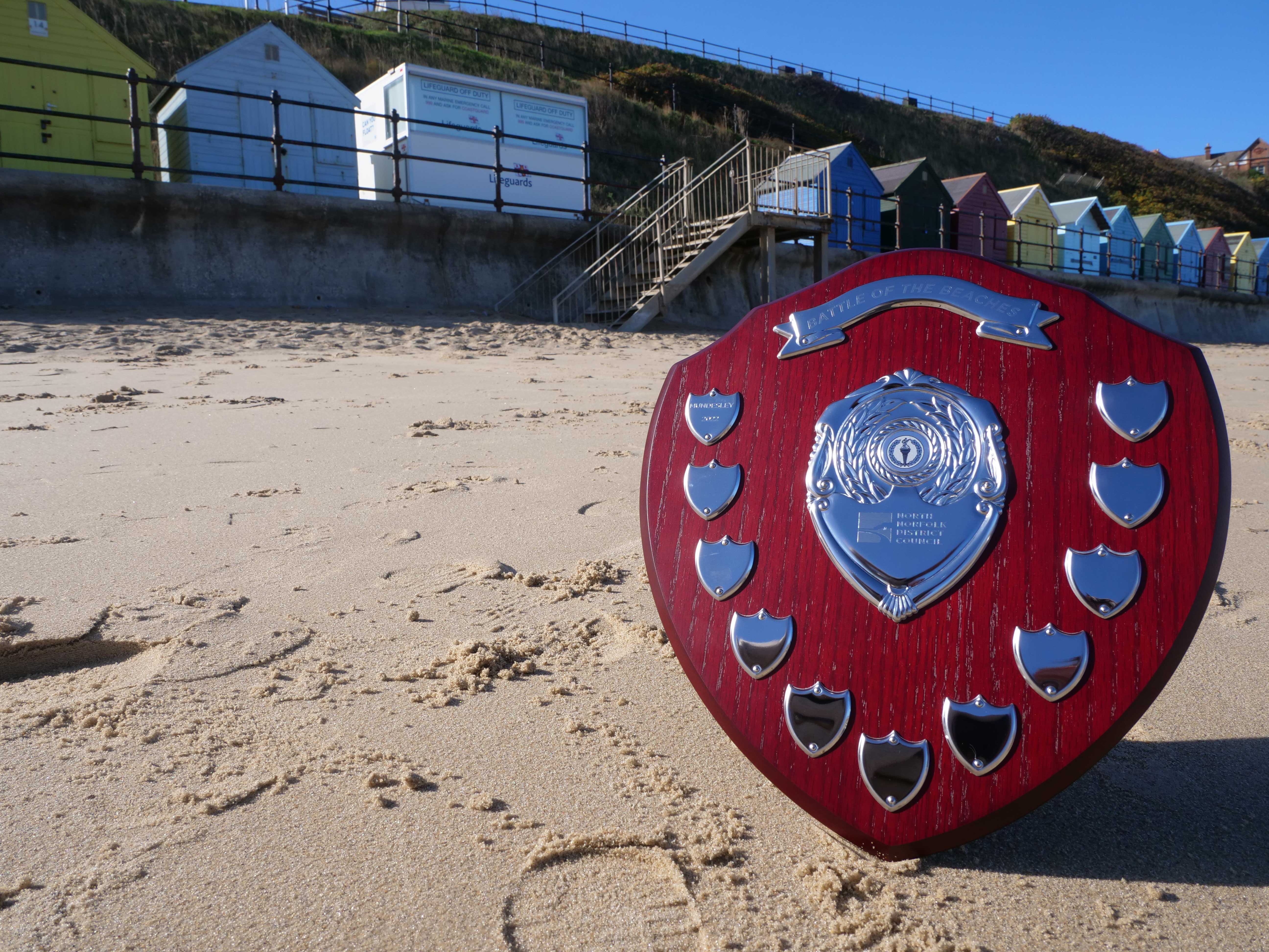Battle of the Beaches trophy on Mundesley beach 2022